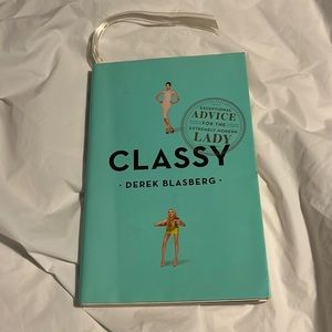 CLASSY. Book on classiness. Some satire and fun and useful advice within.